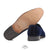 Photo showing leather sole of custom velvet slipper / shoe | Bown of London